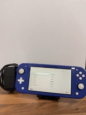 Switch Lite, Unboxed , Blue Grade A With Charger, Small Dent On Stick, grade Good
